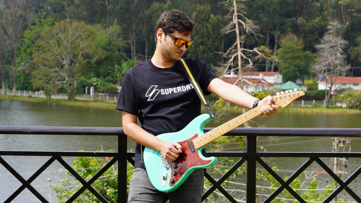 Tandon Hawes with Suhr guitar